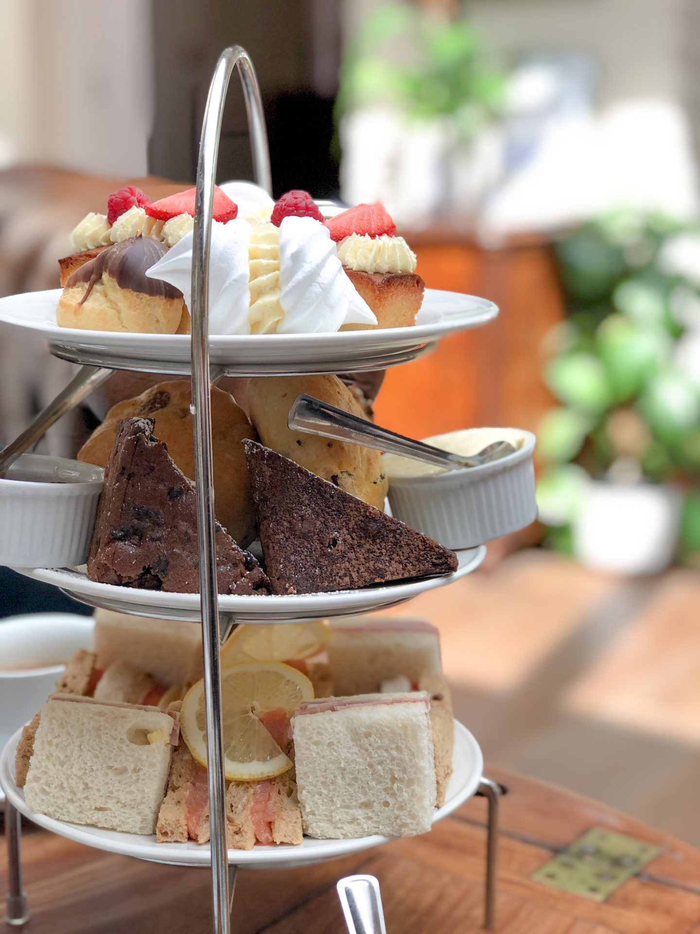 the grove hotel cromer afternoon tea meringue profiteroles brownie fruit scone sandwiches review three tier plate jam and cream
