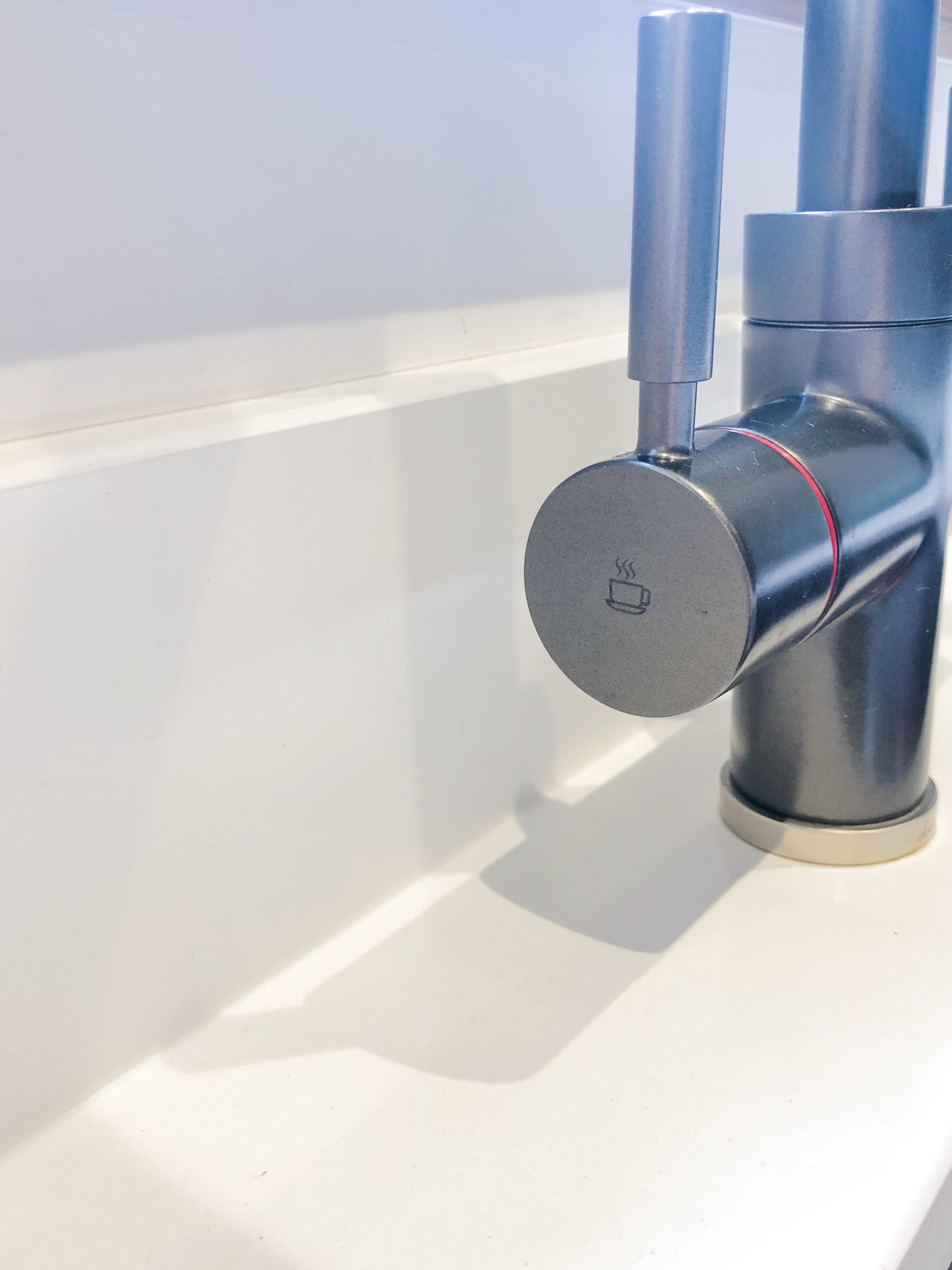 making our house a home why we chose a hot tap instead of a kettle close up of abode pronteau 3-in-1 tap in brushed nickel fitted on white quartz worktop