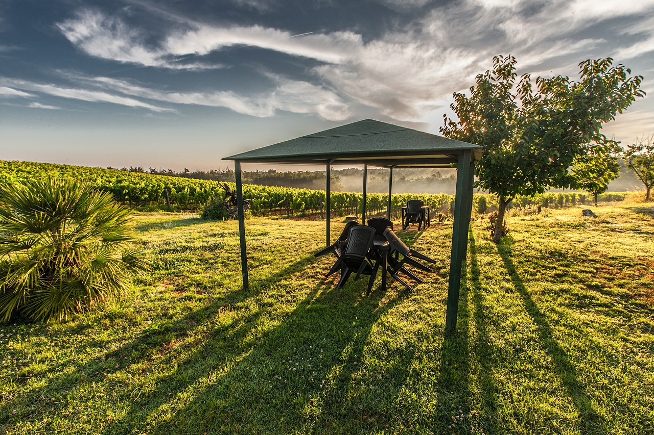 making our house a home adding a gazebo to the garden and why you should consider one gazebo in the middle of the garden with sun bearing down