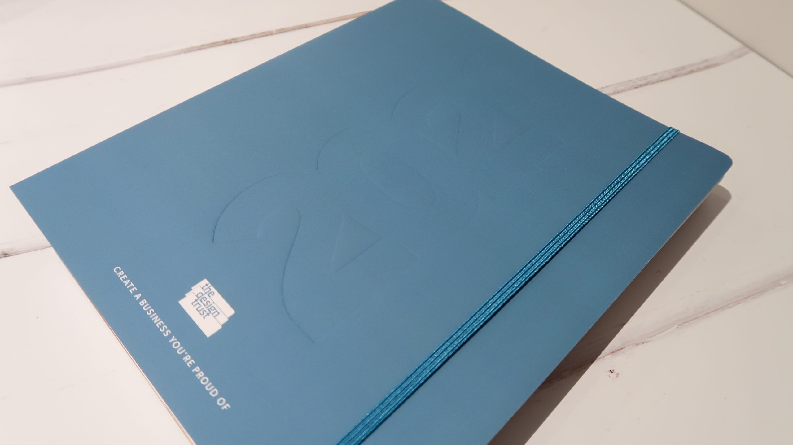 the design trust 2020 planner in dark teal 