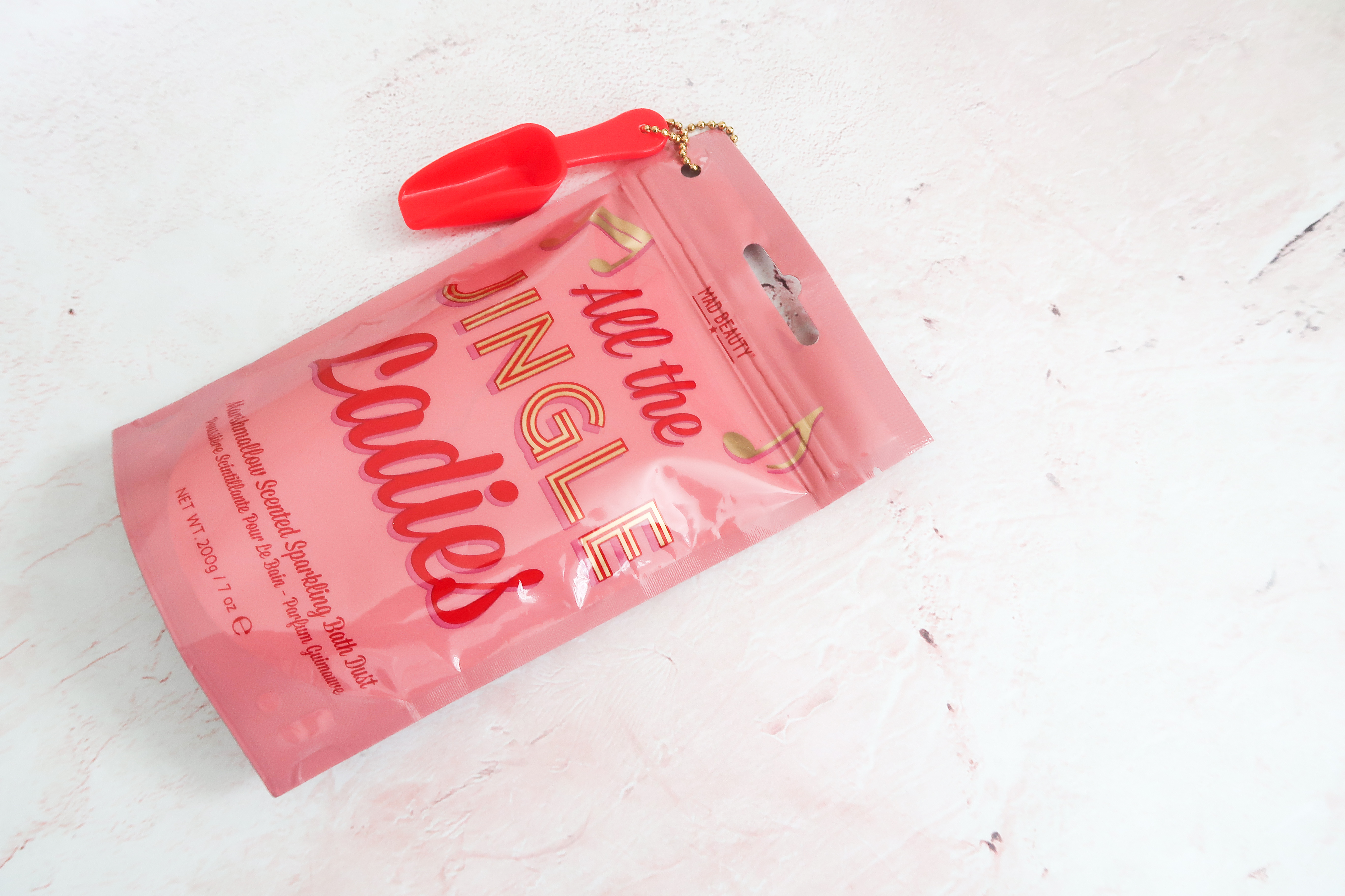 mad beauty jingle ladies bath salts displayed with red scoop