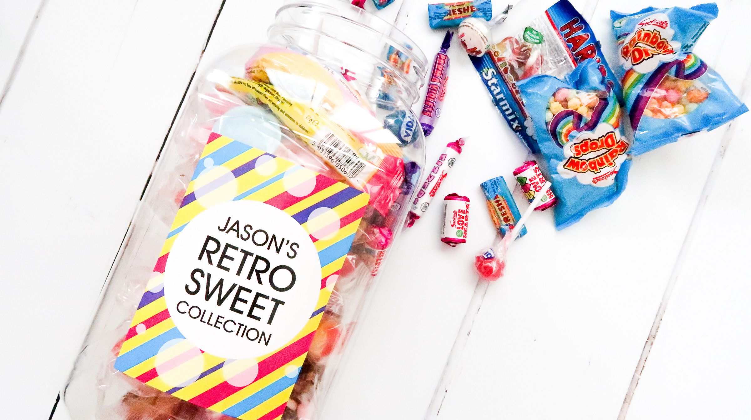 personalised retro sweet collection jar opened with sweets spilling out 