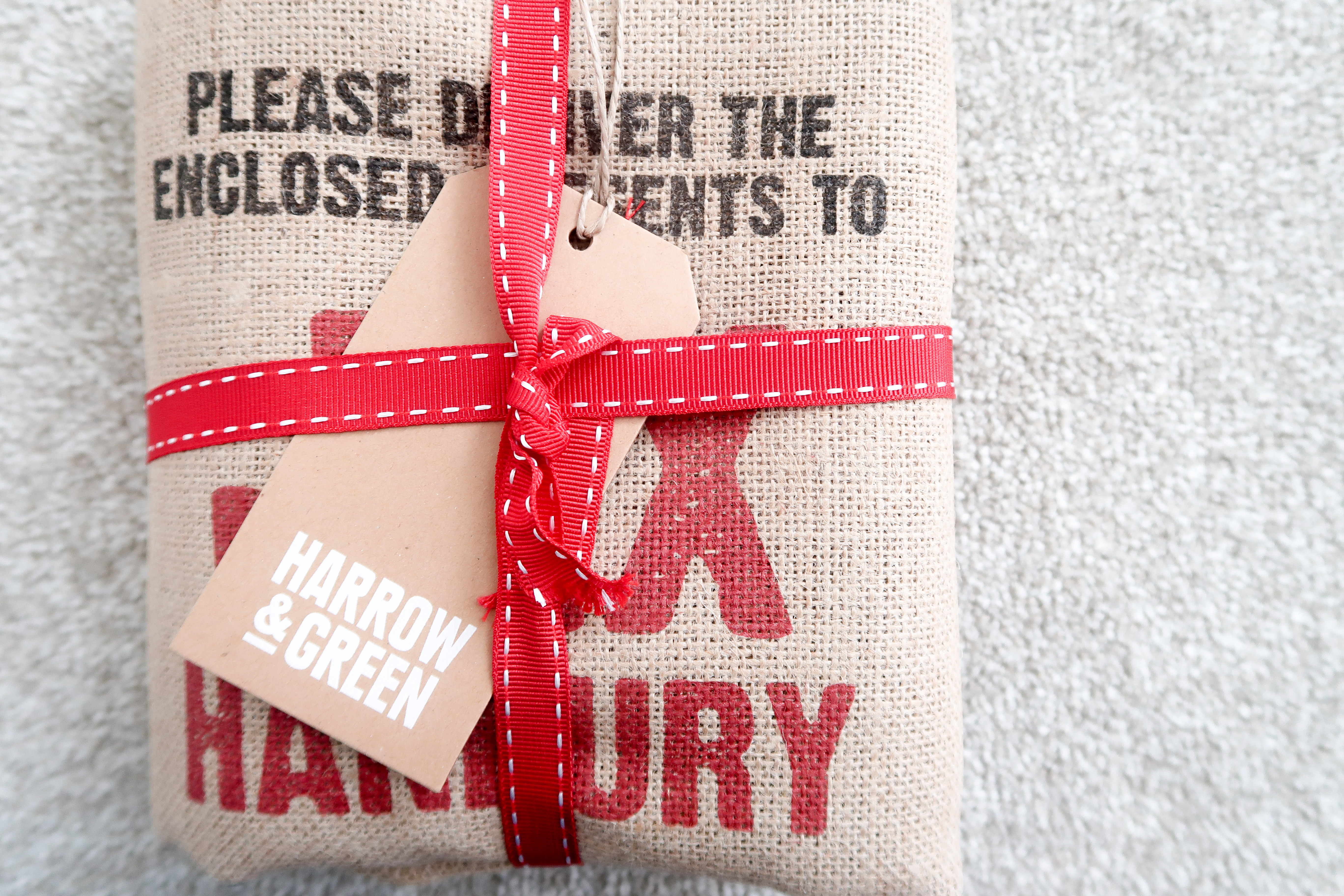 Harrow & green personalised christmas sack tied with ribbon